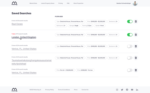 Desktop saved searches list with filters and notification switches
